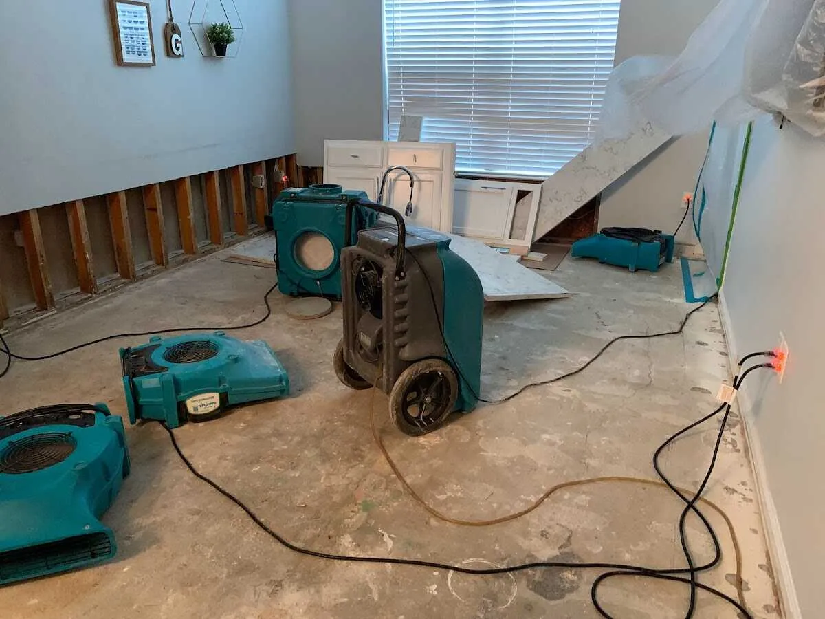 Dehumidifier in flood-cut room for Water Damage Restoration in Red Hook