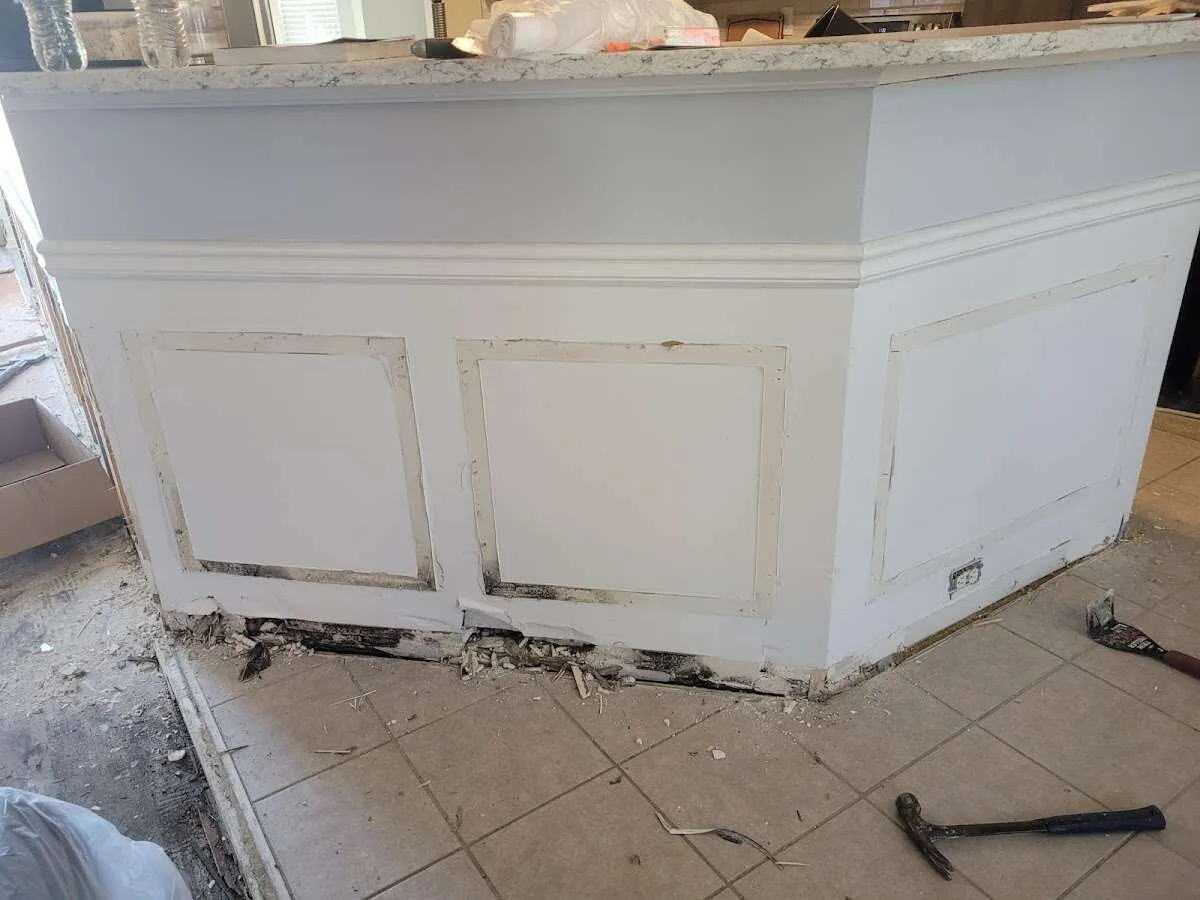 Water damage and mold on kitchen during Storm Damage Restoration in Red Hook